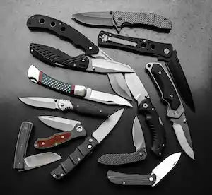 Couteau automatique, couteau karambit, couteau papillon , balisong, hache, poignard, dague, machette, katana